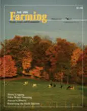 A magazine cover with cows grazing in the background.