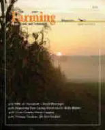 A magazine cover with the sun setting over a field.