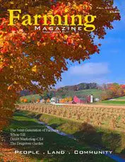 A farm scene with trees and a field.