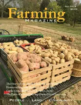 A farm magazine cover with potatoes in crates.