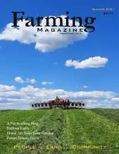 A farm is shown on the cover of farming magazine.